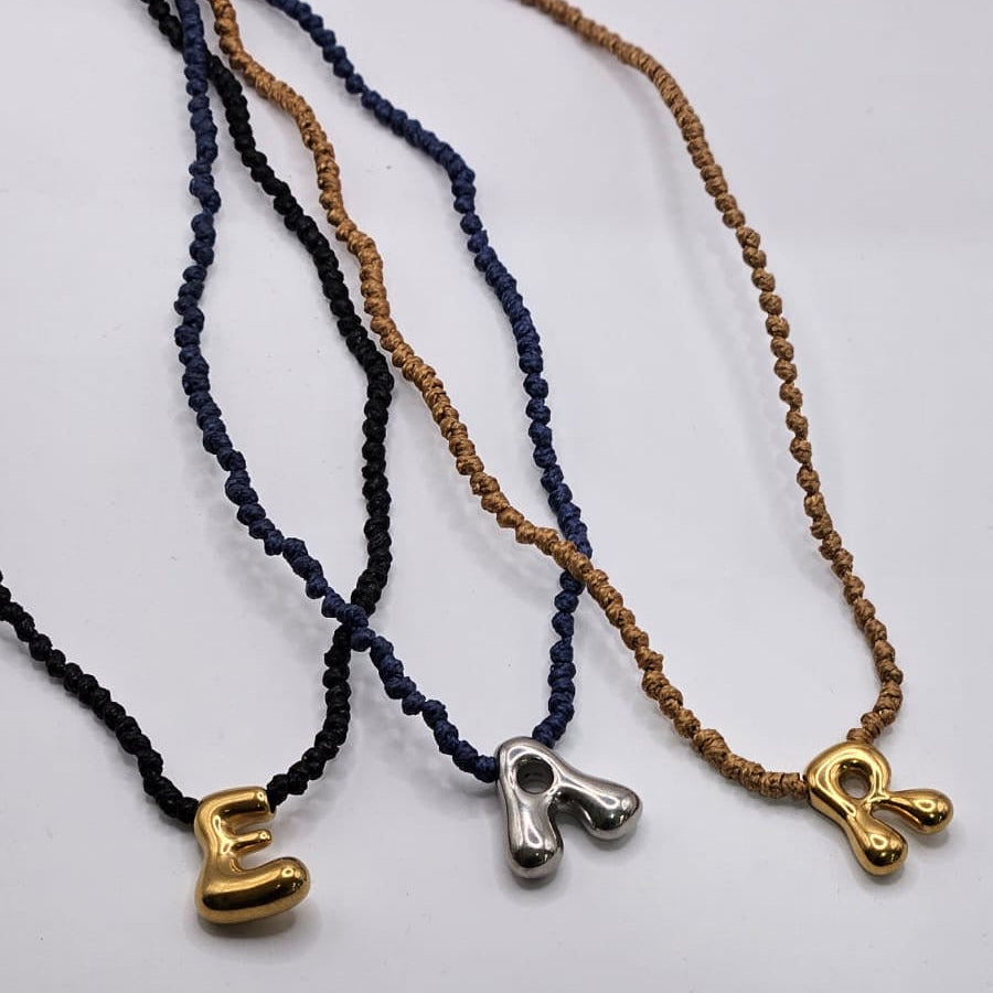 Bubble Initials on Knotted Cord