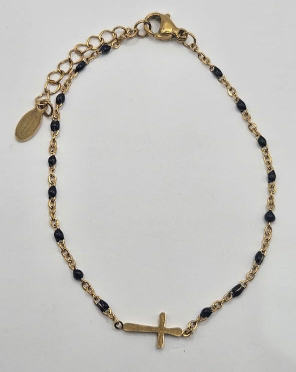 Cross on beaded bracelet