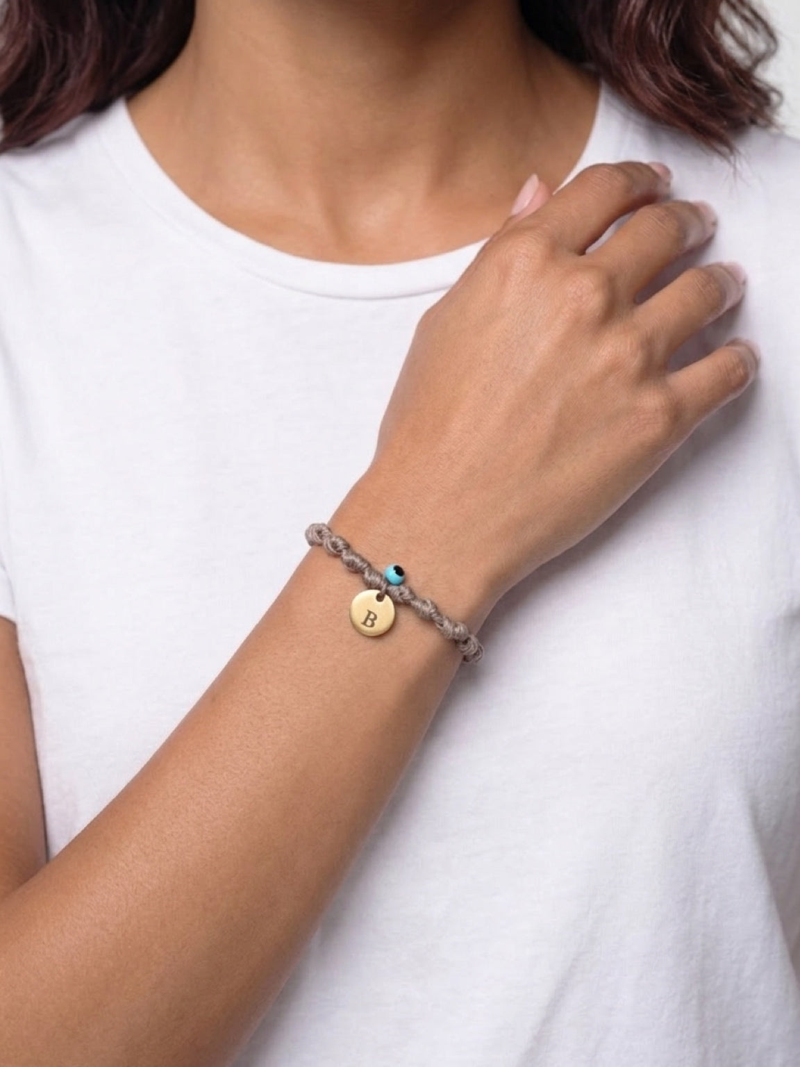 Knotted cord bracelet with gold initial