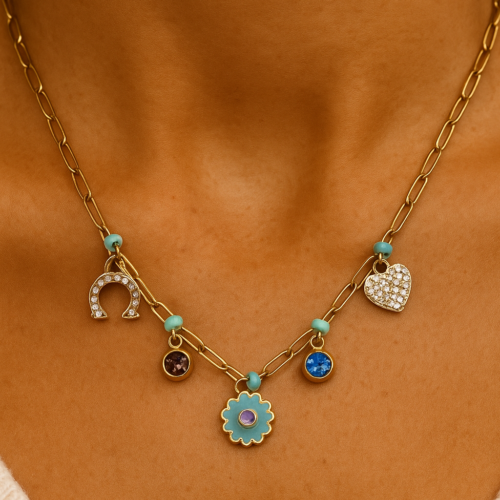 Gold necklace with blue and purple charms