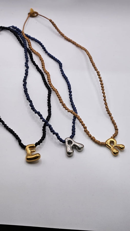 Bubble Initials on Knotted Cord