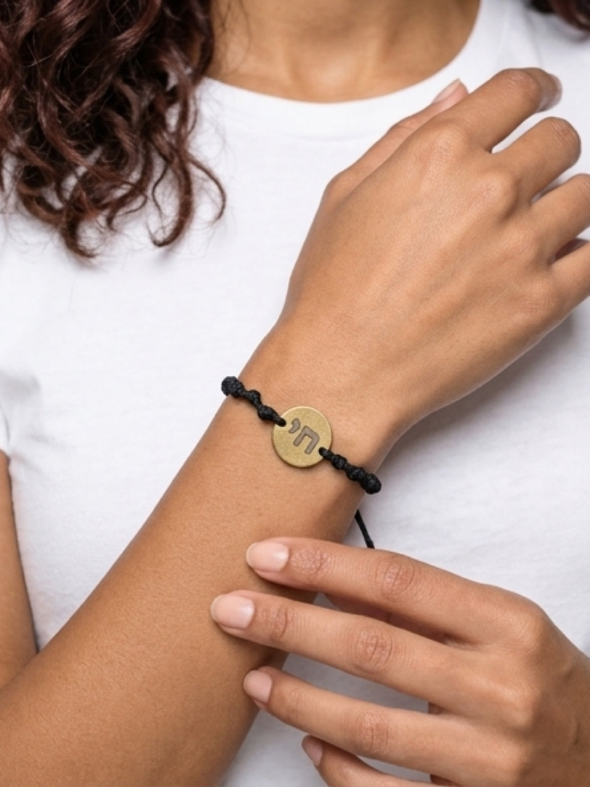 Knotted cord bracelet with chai disc