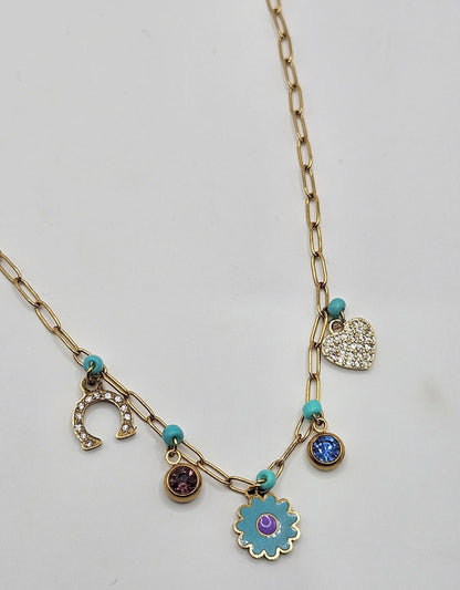 Gold necklace with blue and purple charms