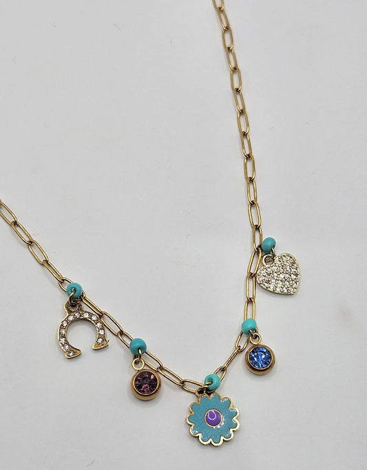 Gold necklace with blue and purple charms
