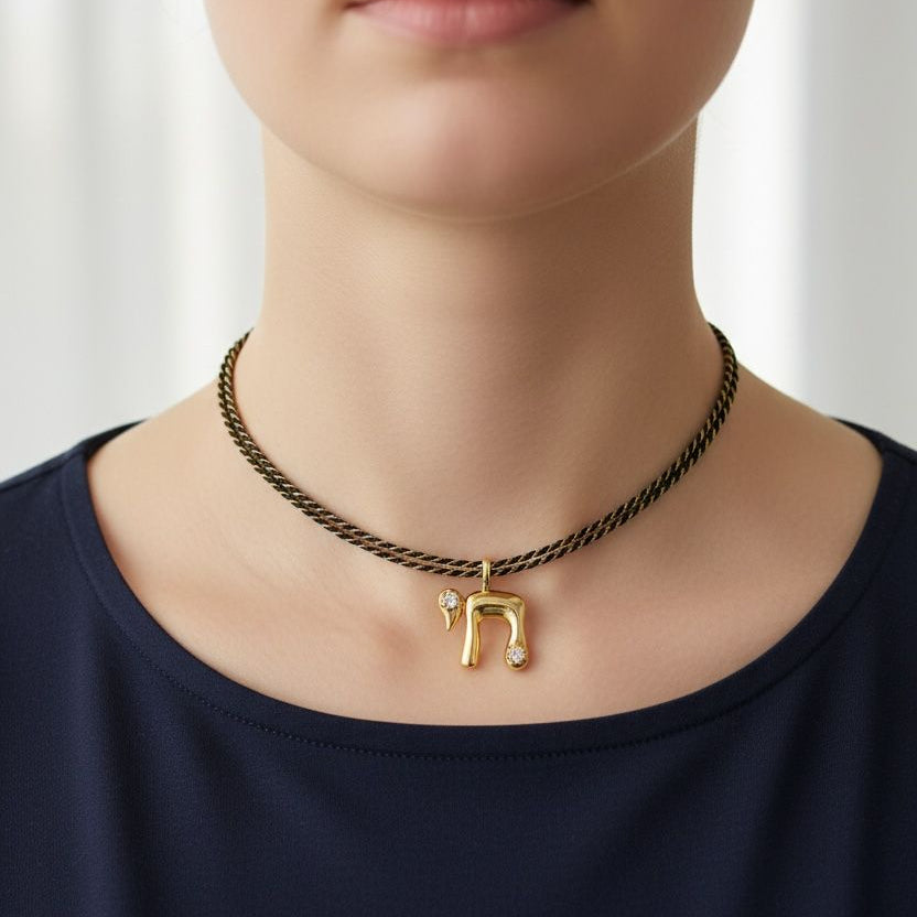 Necklace with a gold pendant