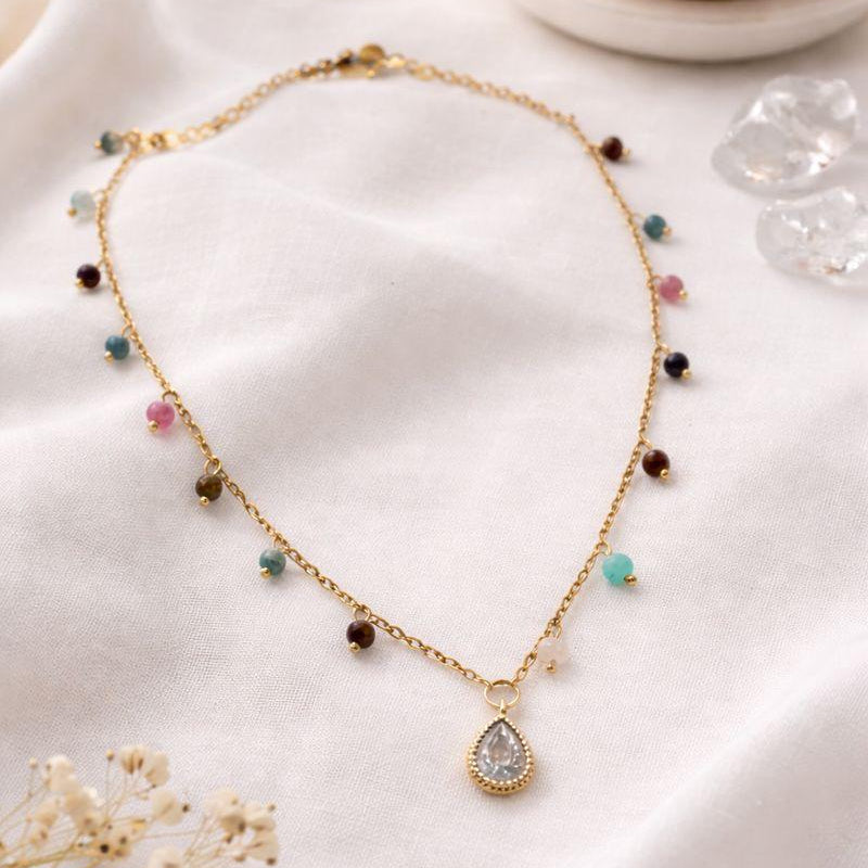 Necklace with multicolored beads and a teardrop-shaped pendant