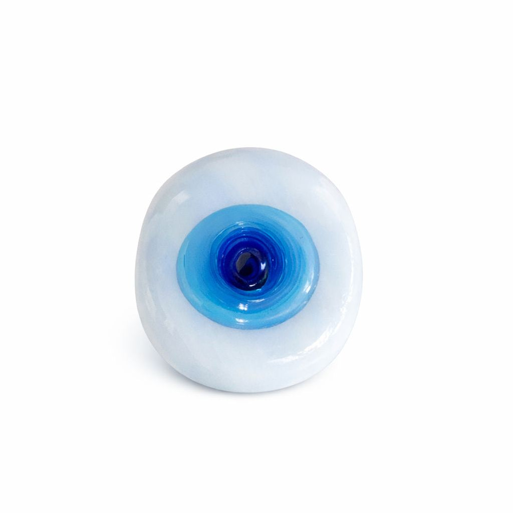 Evil eye with blue center on a white background